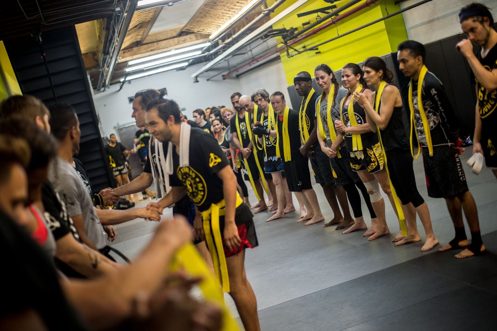 Congratulatory handshake after martial arts competition